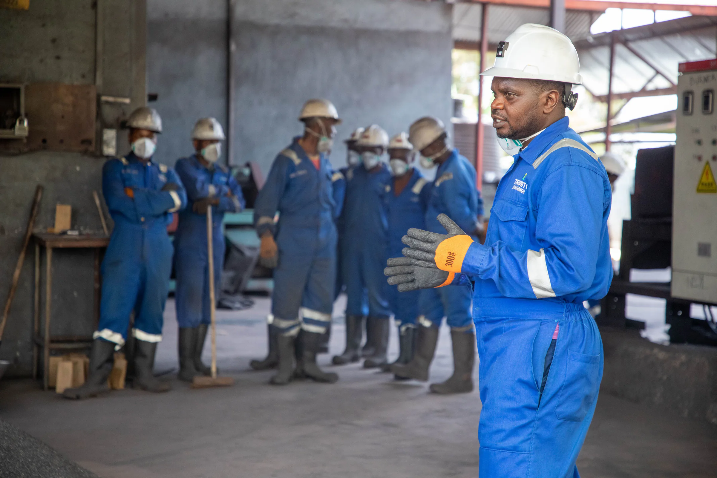 A factory team receiving hands-on implementation training